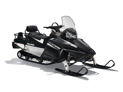 Black and great Polaris Widetrak snowmobile sitting in front of a white background